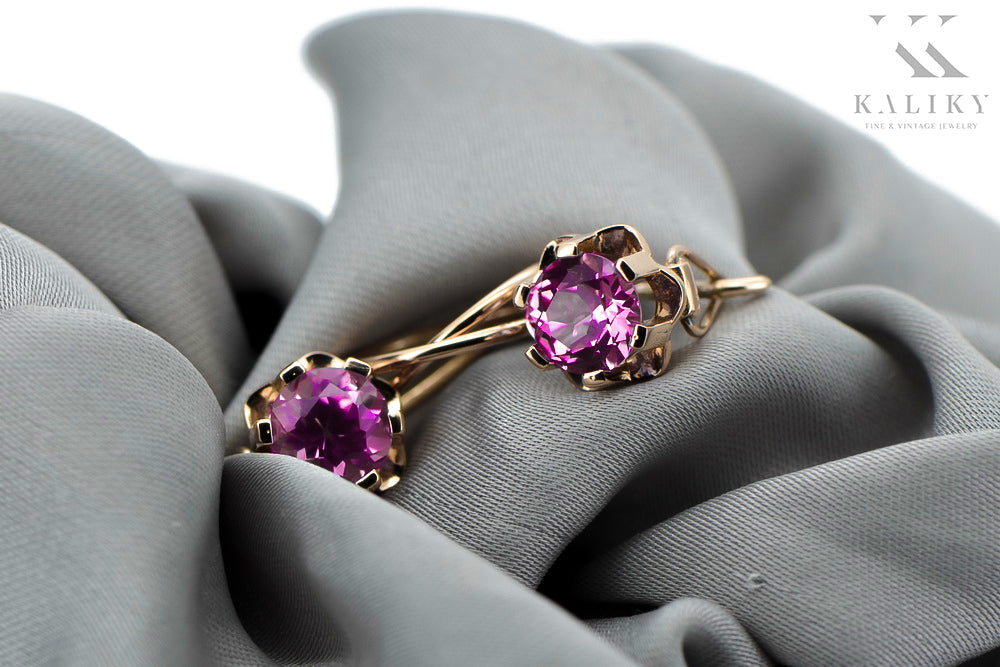 Vintage Amethyst Earrings in 14K Rose Gold (vec019r-am) — worn on the hand, showing profile