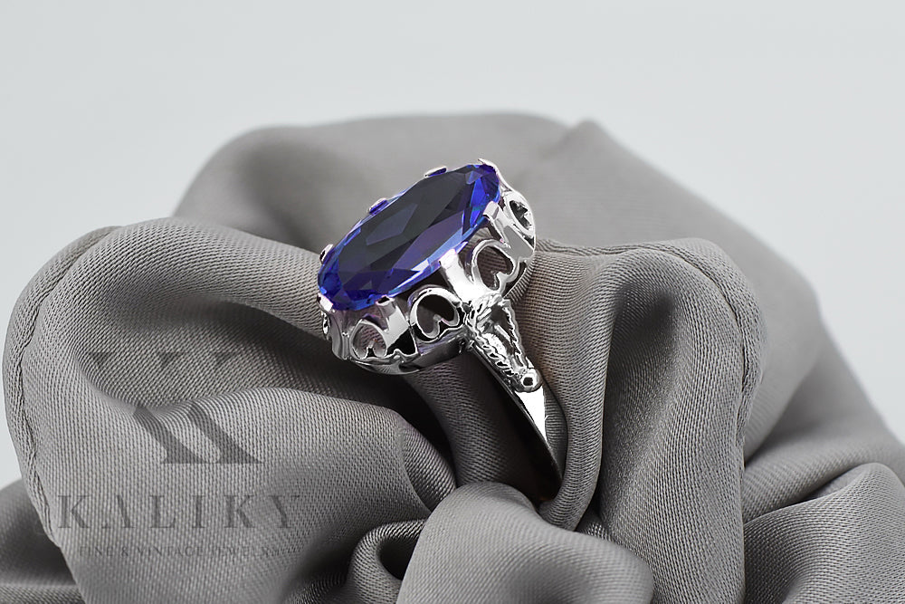 Vintage Sapphire Ring in Sterling Silver (vrc134s-sp) — worn on the neckline, showing the drape
