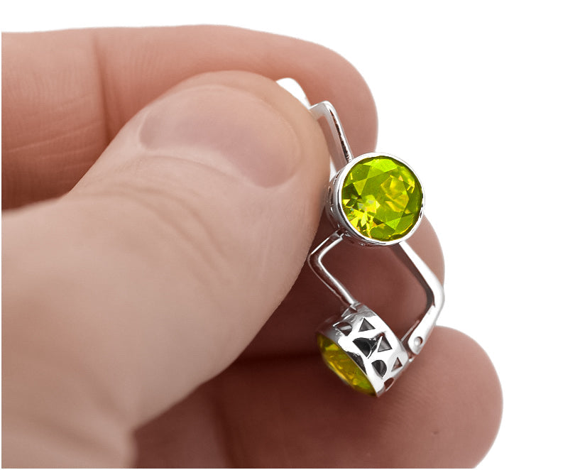 Vintage Yellow Peridot Earrings in Sterling Silver (vec107s-yp) — worn on the hand, showing profile