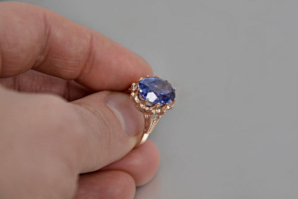 Vintage Alexandrite Ring in 14K Rose Gold (vrc079r-ax) — worn on the neckline, showing the drape