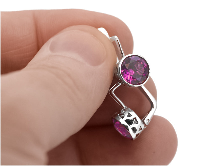 Vintage Amethyst Earrings in Sterling Silver (vec107s-am) — worn on the hand, showing profile