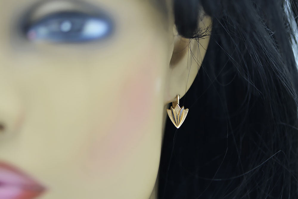 Vintage Leaf Earrings in 14K Rose Gold (ven170) — worn on the neckline, showing the drape