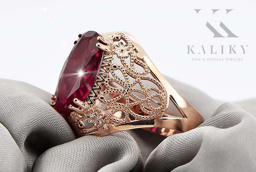 Vintage Ruby Ring in 14K Rose Gold (vrc074r-rb) — worn on the neckline, showing the drape
