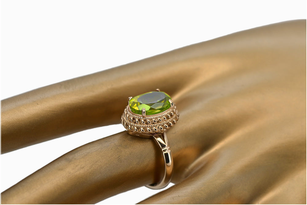 Vintage Yellow Peridot Ring in 14K Rose Gold (vrc068r-yp) — worn on the neckline, showing the drape