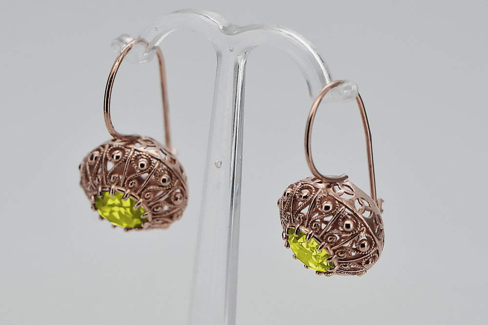 Vintage Yellow Peridot Earrings in 14K Rose Gold (vec002r-yp) — worn on the neckline, showing the drape