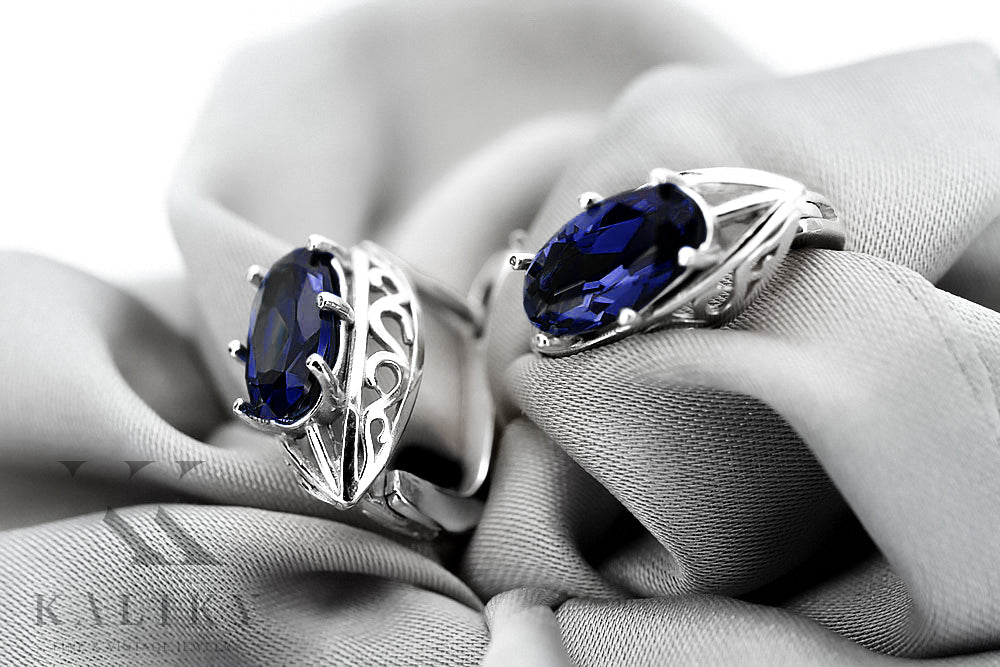 Vintage Sapphire Earrings in Sterling Silver (vec141s-sp) — worn on the neckline, showing the drape