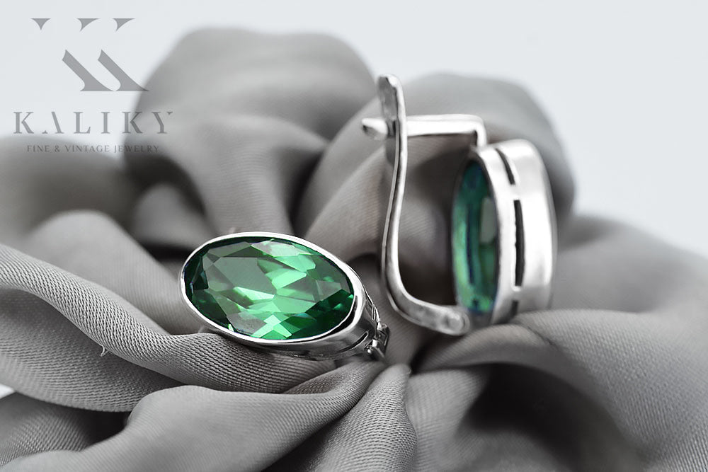 Vintage Emerald Earrings in Sterling Silver (vec001s-em) — worn on the hand, showing profile