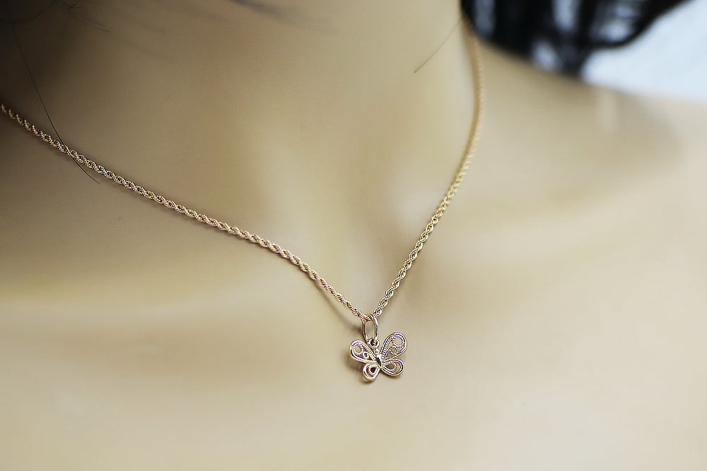 Vintage Butterfly Pendant in 14K Rose Gold (vpn062) — close-up of the hallmark on the inner band