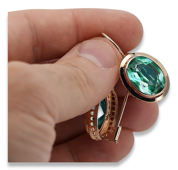 Vintage Emerald Earrings in 14K Rose Gold (vec114r-em) — worn on the neckline, showing the drape