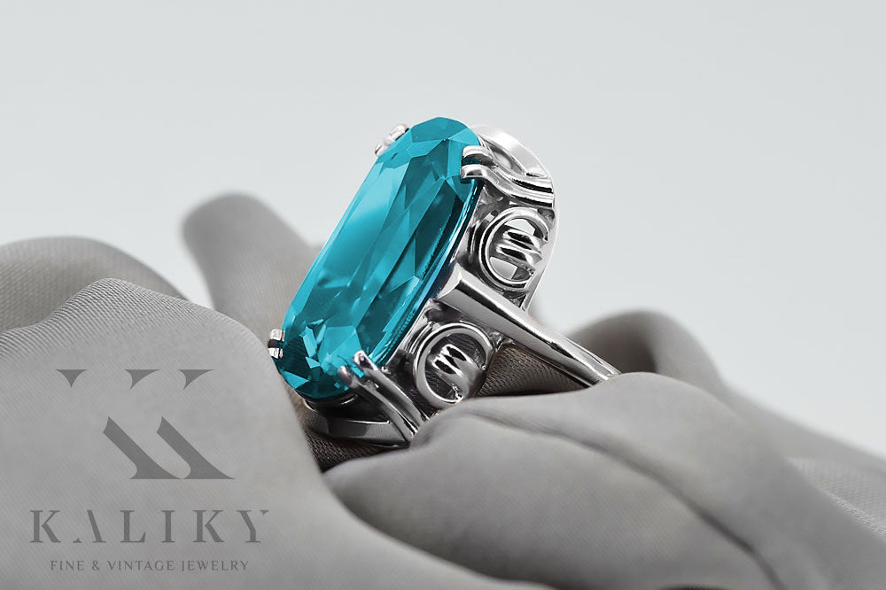 Vintage Aquamarine Ring in Sterling Silver (vrc038s-aq) — worn on the neckline, showing the drape