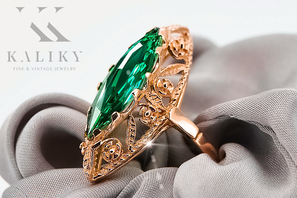 Vintage Emerald Ring in 14K Rose Gold (vrc005r-em) — worn on the neckline, showing the drape