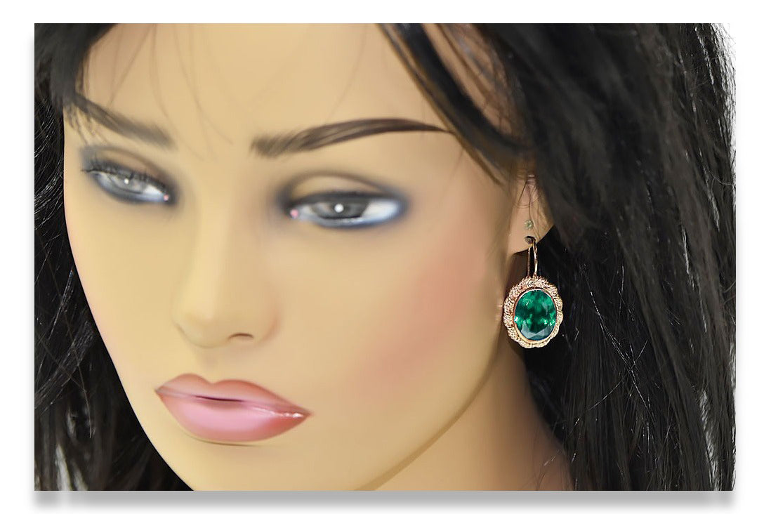 Vintage Emerald Craft Earrings in 14K Rose Gold (vec007r-em) — worn on the hand, showing profile