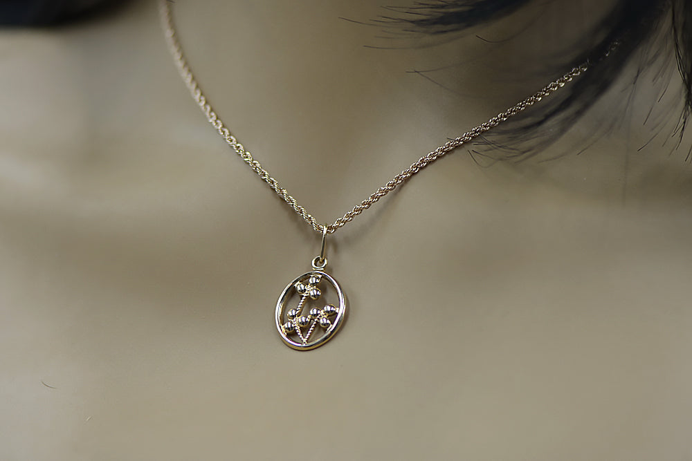 Vintage Leaf Pendant in 14K Rose Gold (vpn064) — close-up of the hallmark on the inner band