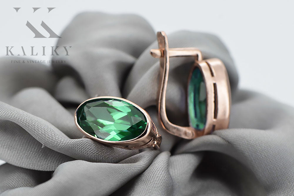 Vintage Emerald Earrings in 14K Rose Gold (vec001r-em) — worn on the neckline, showing the drape