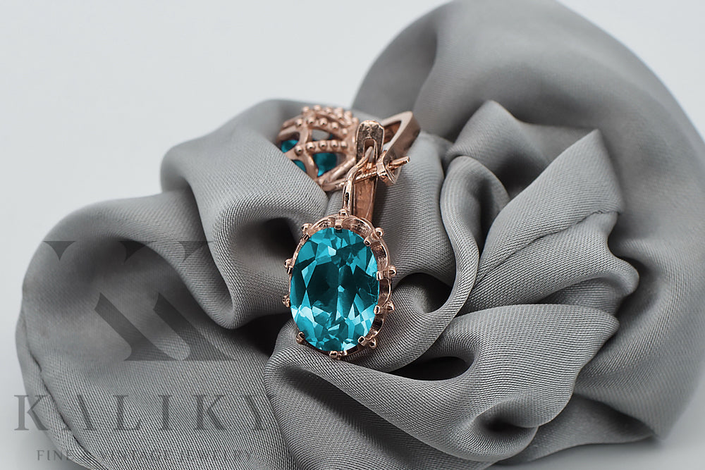 Vintage Aquamarine Earrings in 14K Rose Gold (vec079r-aq) — worn on the neckline, showing the drape