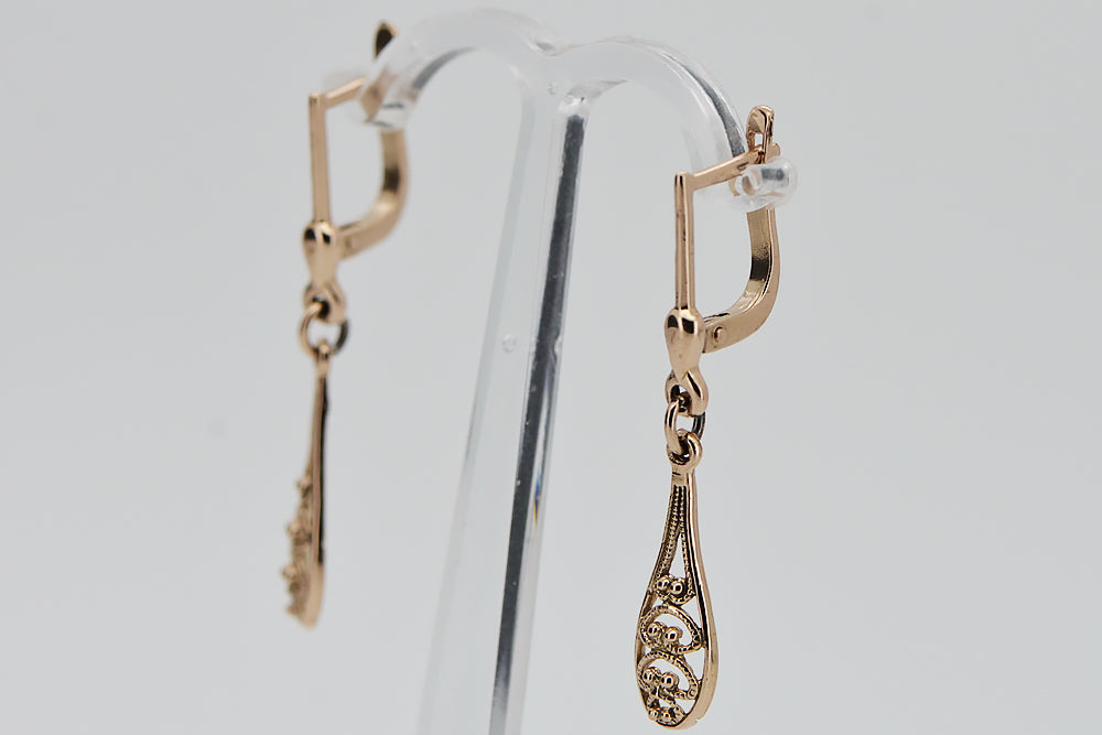 Vintage Leaf Earrings in 14K Rose Gold (ven239) — worn on the hand, showing profile