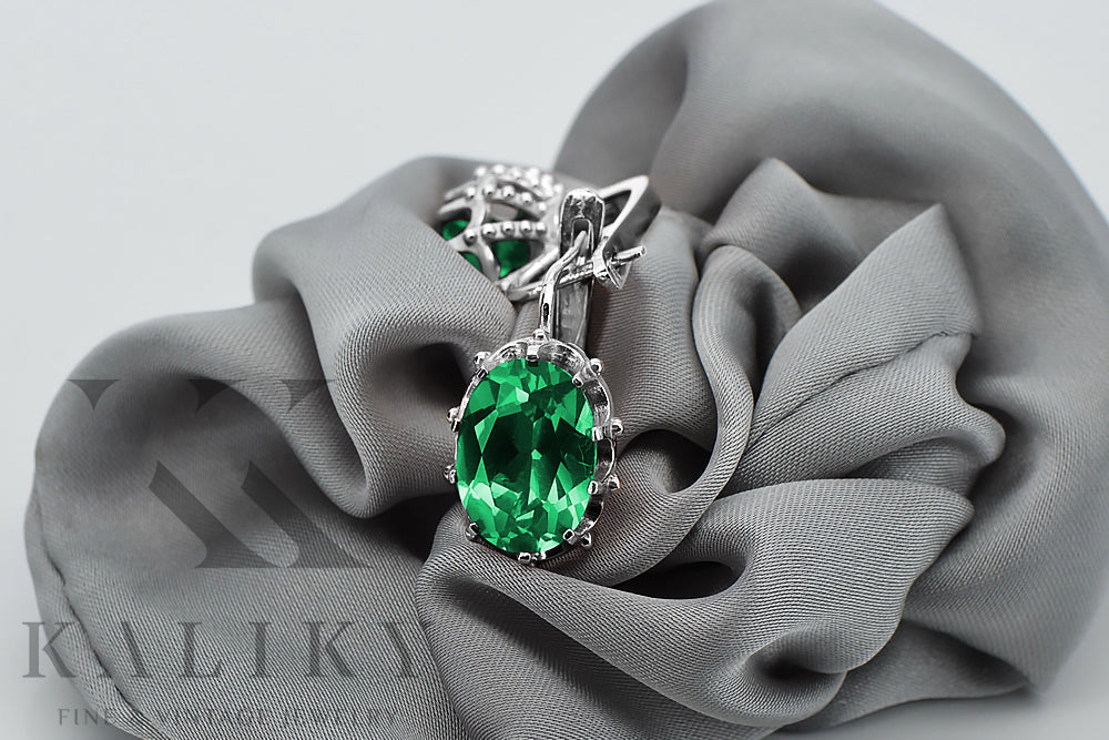Vintage Emerald Earrings in Sterling Silver (vec079s-em) — worn on the neckline, showing the drape