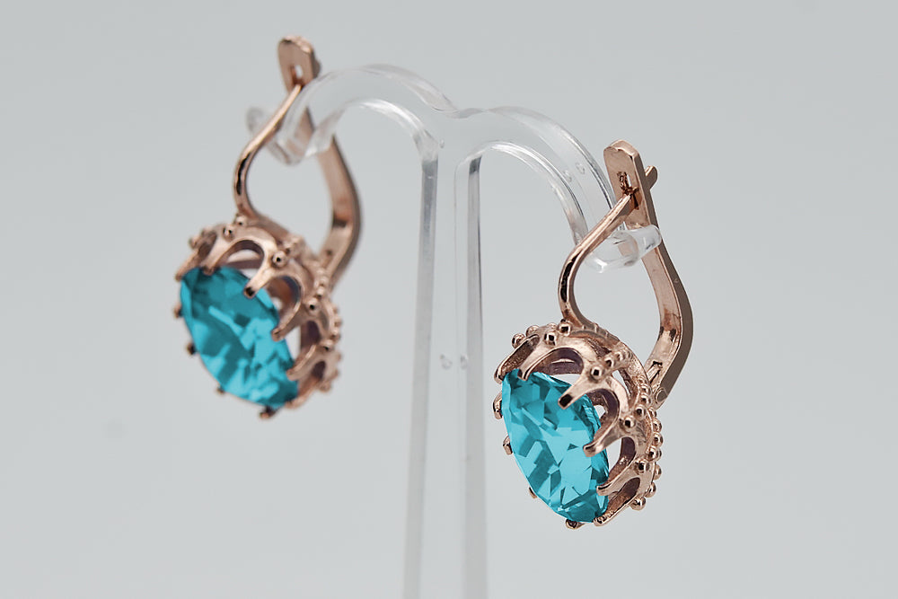 Vintage Aquamarine Earrings in 14K Rose Gold (vec079r-aq) — worn on the hand, showing profile