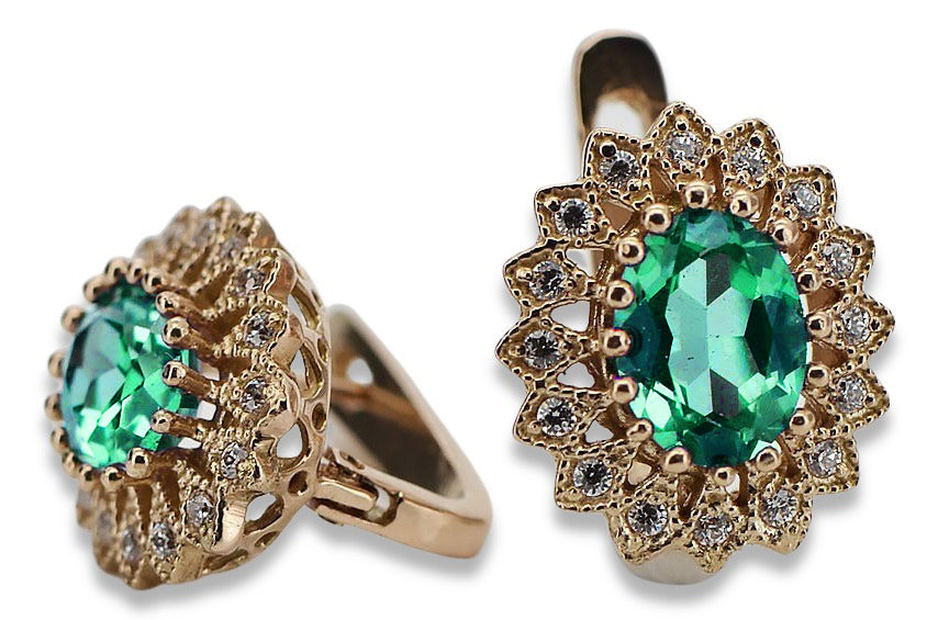 Vintage Emerald Earrings in 14K Rose Gold (vec125r-em) — worn on the hand, showing profile