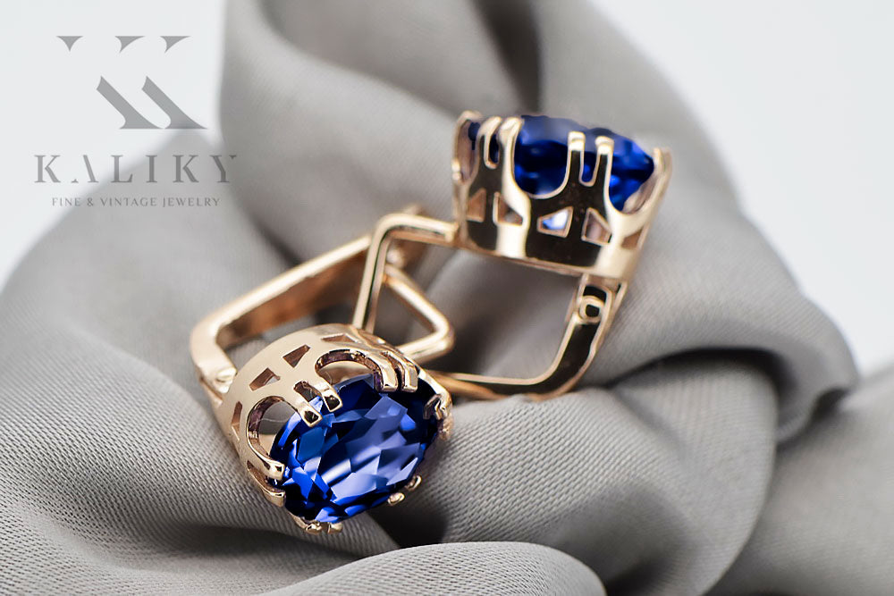 Vintage Sapphire Earrings in 14K Rose Gold (vec016r-sp) — worn on the neckline, showing the drape