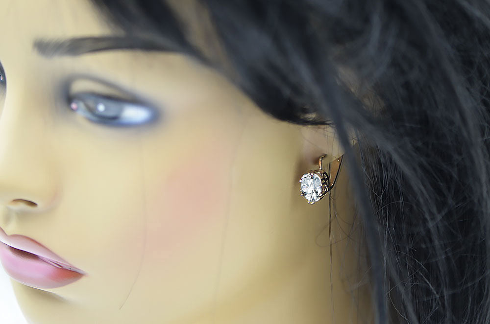 Vintage Zircon Earrings in 14K Rose Gold (vec016r-zi) — worn on the neckline, showing the drape
