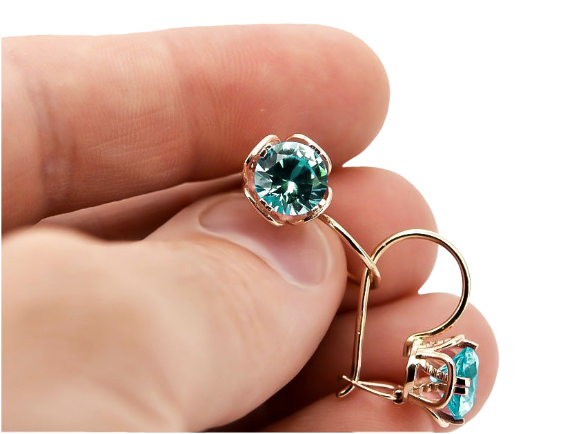 Vintage Emerald Earrings in 14K Rose Gold (vec029r-em) — worn on the neckline, showing the drape