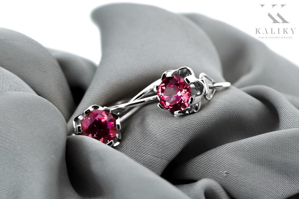 Vintage Ruby Earrings in Sterling Silver (vec019s-rb) — worn on the hand, showing profile