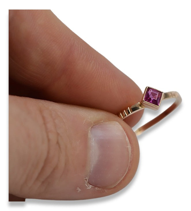 Vintage Ruby Ring in 14K Rose Gold (vrc138r-rb) — worn on the neckline, showing the drape