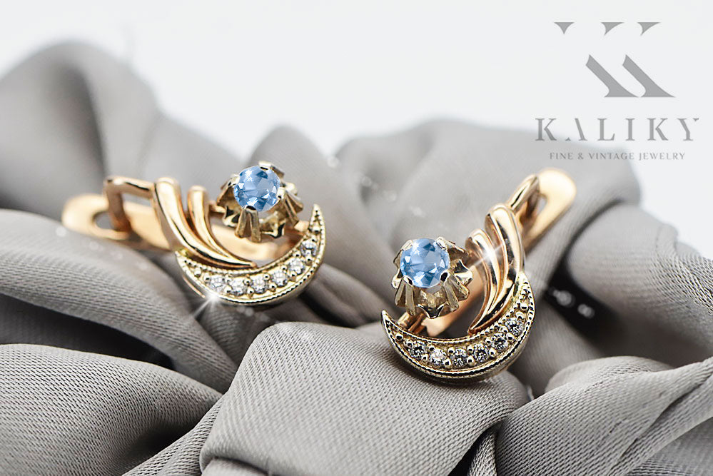 Vintage Aquamarine Earrings in 14K Rose & White Gold (vec093rw-aq) — worn on the neckline, showing the drape