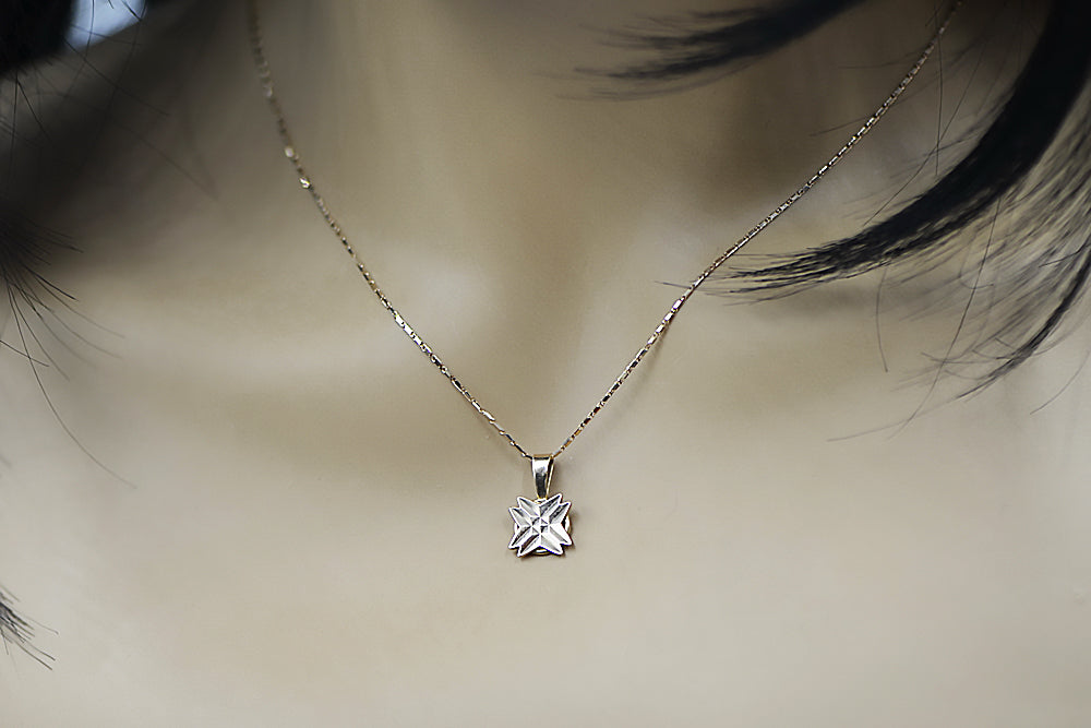 Vintage Star Pendant in 14K Rose Gold (vpn093) — worn on the hand, showing profile