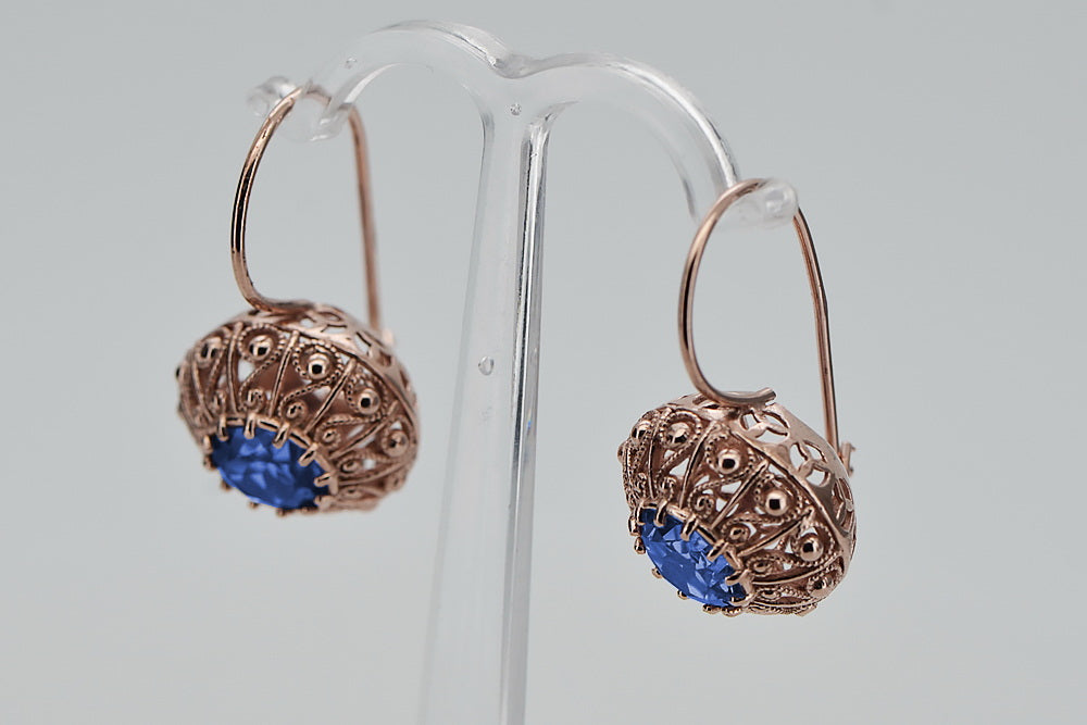 Vintage Sapphire Earrings in 14K Rose Gold (vec002r-sp) — worn on the hand, showing profile