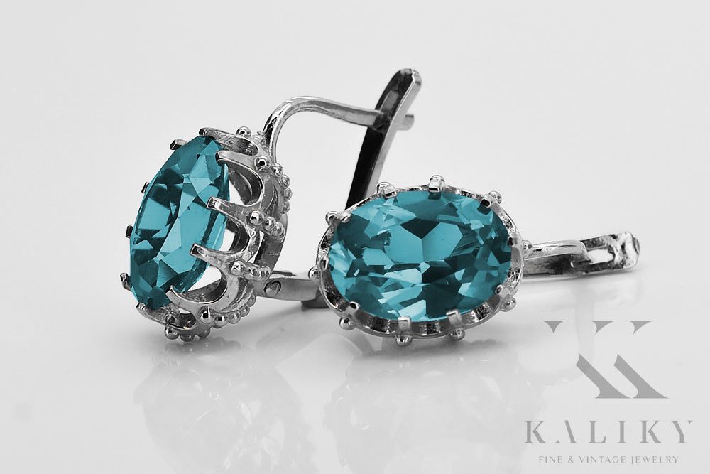 Vintage Aquamarine Earrings in Sterling Silver (vec079s-aq) — worn on the neckline, showing the drape
