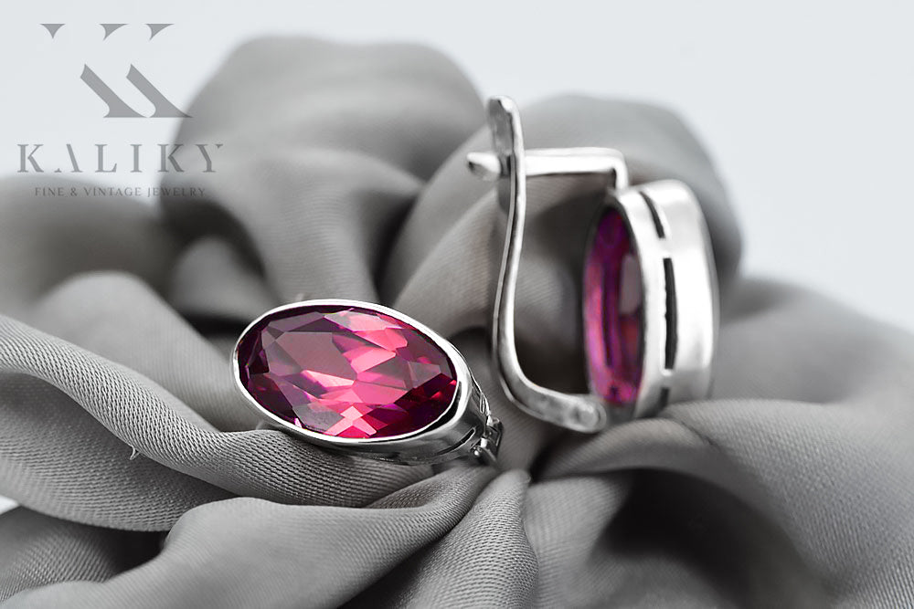 Vintage Ruby Earrings in Sterling Silver (vec001s-rb) — worn on the hand, showing profile