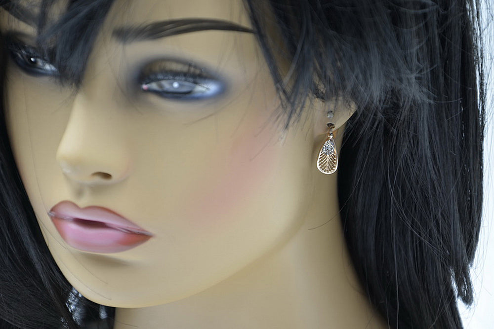 Vintage Zircon Zircone Earrings in 14K Rose Gold (vec067r-zi) — worn on the hand, showing profile