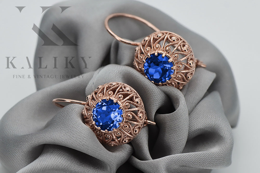 Vintage Sapphire Earrings in 14K Rose Gold (vec002r-sp) — worn on the neckline, showing the drape