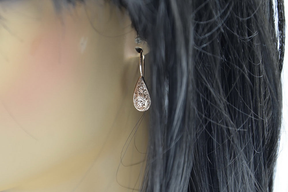 Vintage Earrings in Rose Gold-Plated Sterling Silver (ven023rp) — worn on the hand, showing profile