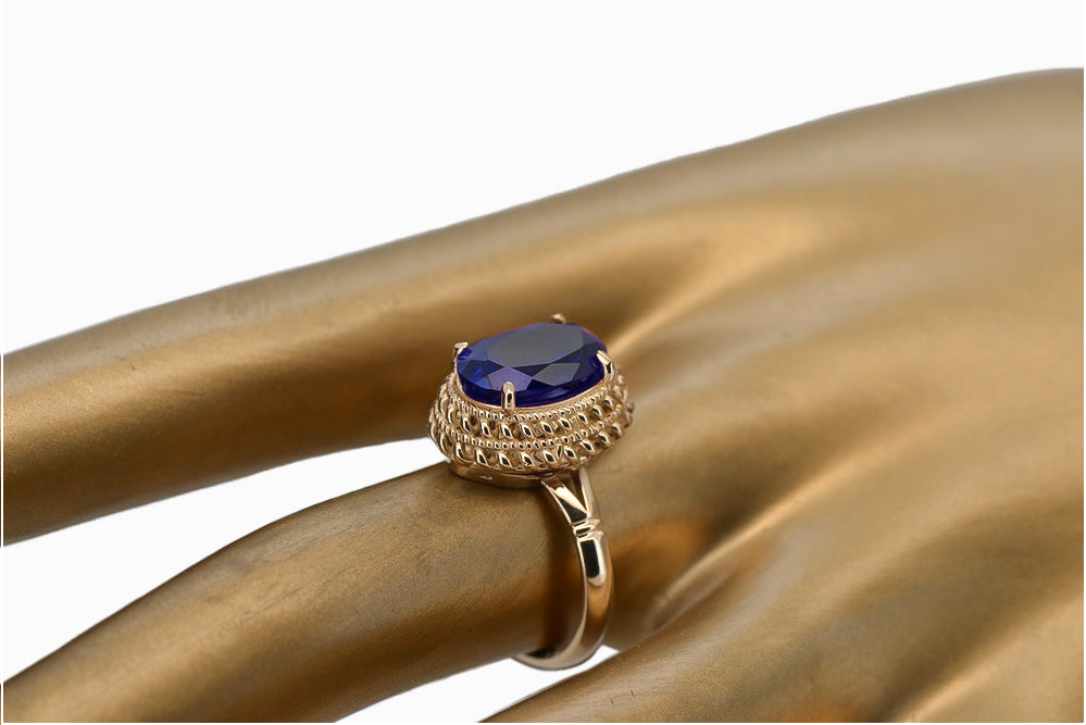 Vintage Sapphire Ring in 14K Rose Gold (vrc068r-sp) — worn on the hand, showing profile