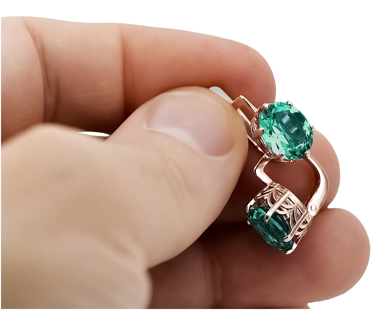 Vintage Emerald Earrings in 14K Rose Gold (vec003r-em) — worn on the hand, showing profile