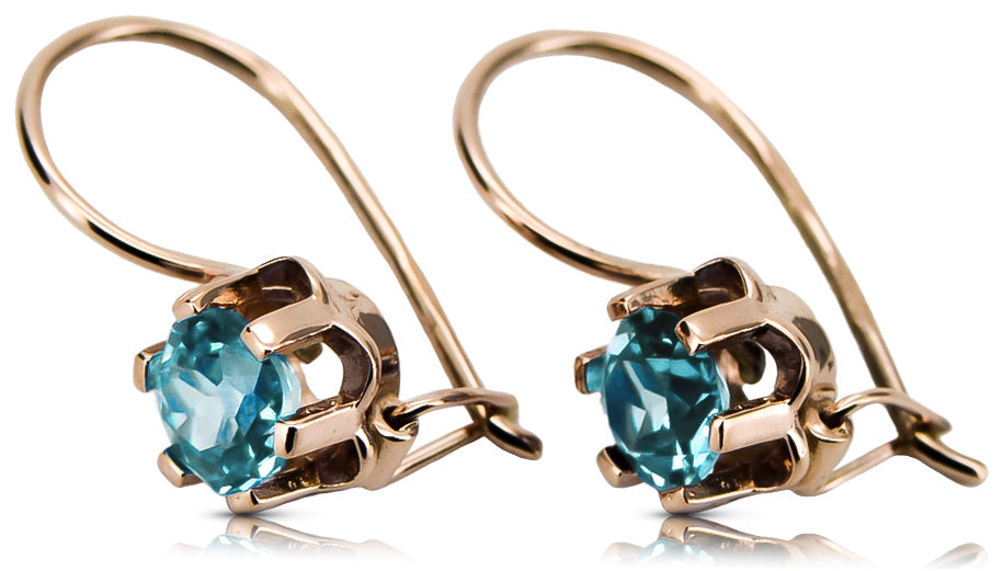 Vintage Aquamarine Earrings in 14K Rose Gold (vec019r-aq) — worn on the neckline, showing the drape