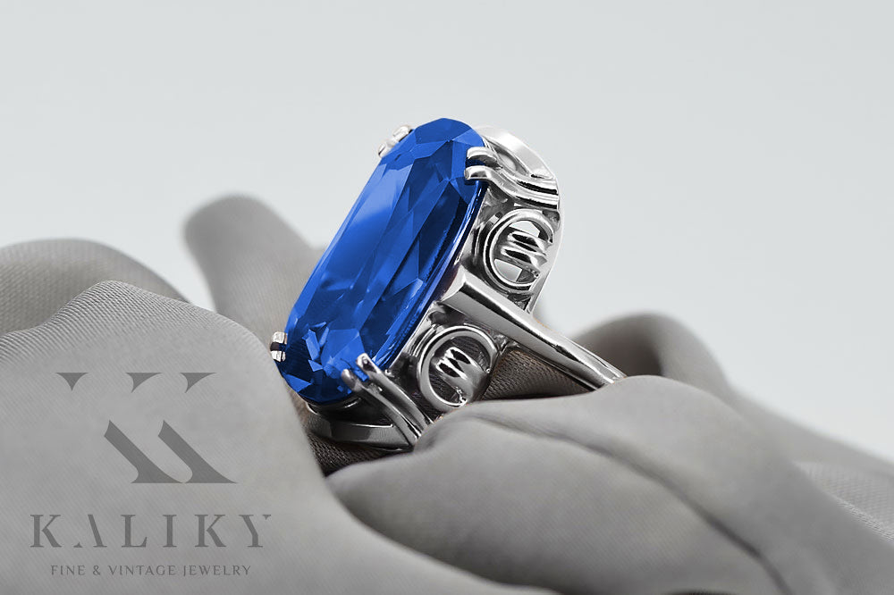 Vintage Sapphire Ring in Sterling Silver (vrc038s-sp) — worn on the neckline, showing the drape