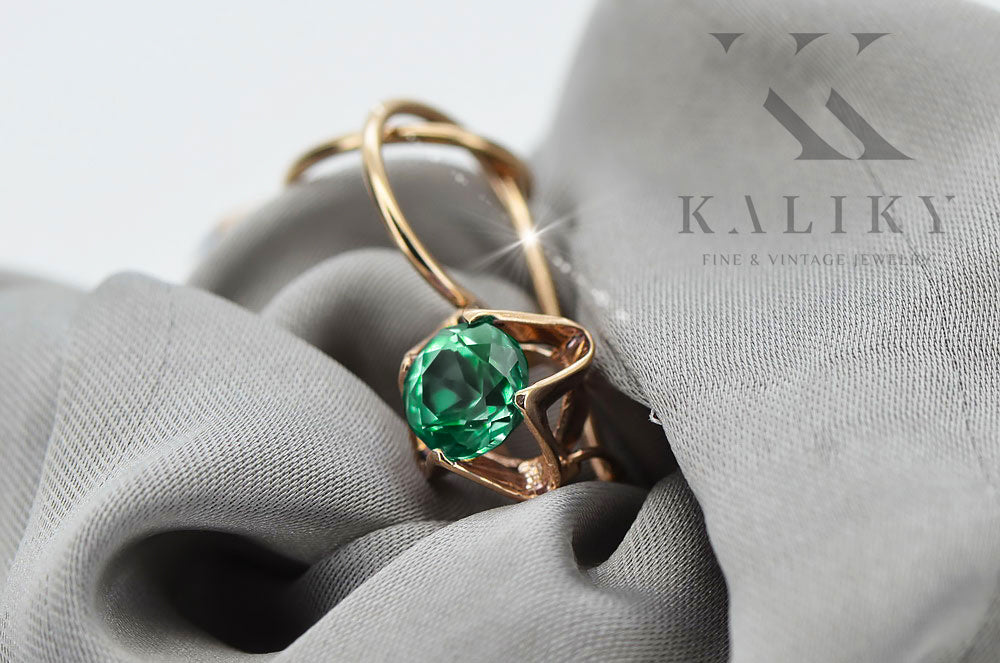 Vintage Emerald Earrings in 14K Rose Gold (vec142r-em) — worn on the hand, showing profile