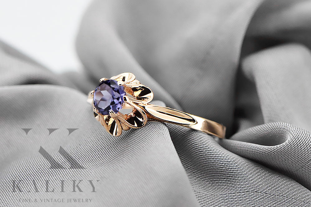 Vintage Alexandrite Ring in 14K Rose Gold (vrc004r-ax) — worn on the neckline, showing the drape