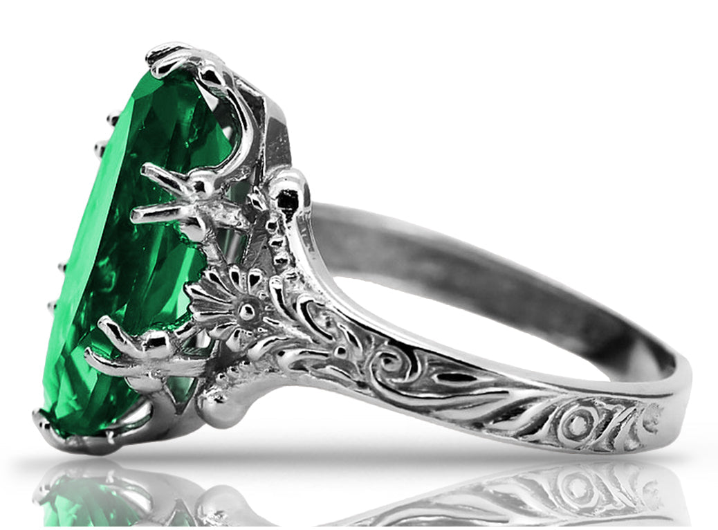 Vintage Emerald Oval Polish Ring in Sterling Silver (vrc084s-em) — close-up of the stone and setting