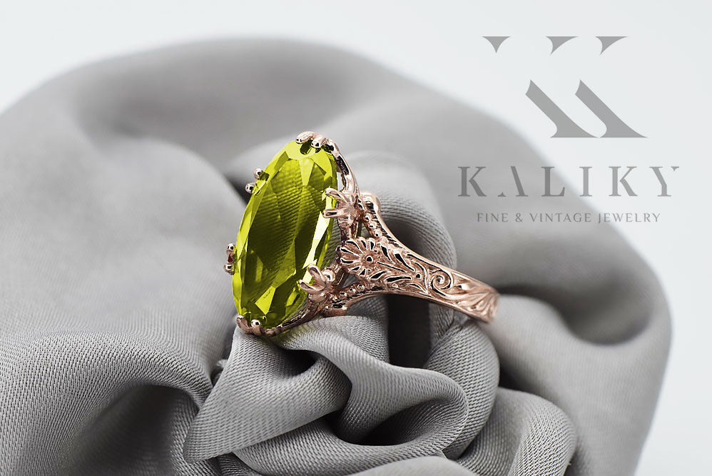 Vintage Yellow Peridot Ring in 14K Rose Gold (vrc084r-yp) — worn on the neckline, showing the drape