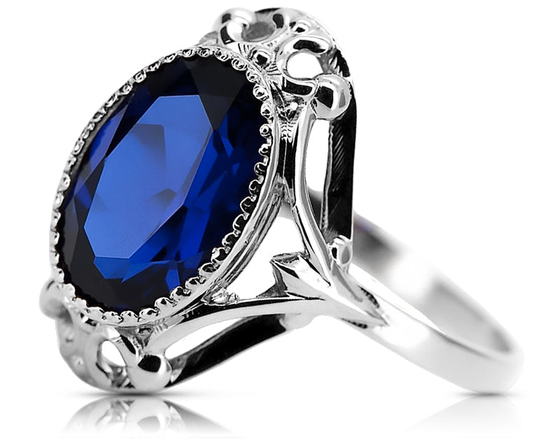 Vintage Sapphire Ring in Sterling Silver (vrc128s-sp) — worn on the neckline, showing the drape