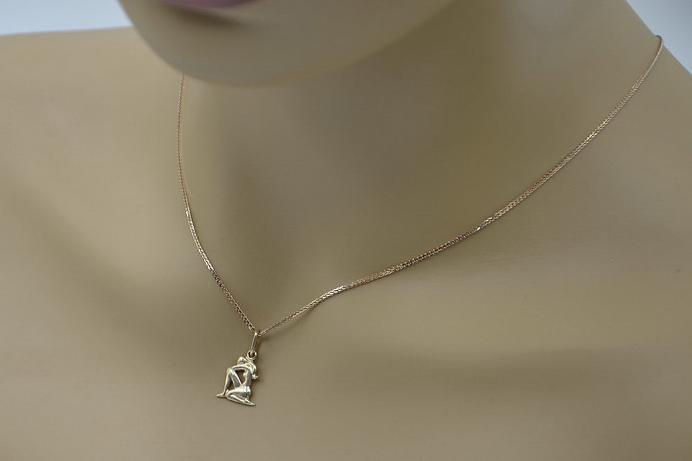 Vintage Aries Lady Zodiac Pendant Vzp Pendant in 14K Rose Gold (f0t7oz) — close-up of the hallmark on the inner band