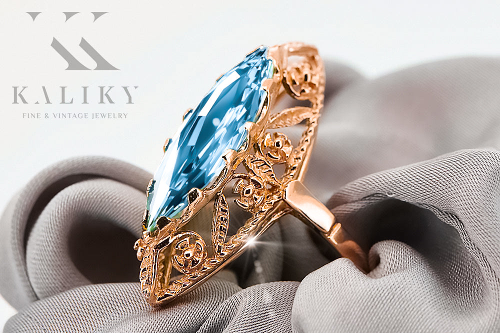 Vintage Aquamarine Ring in 14K Rose Gold (vrc005r-aq) — worn on the neckline, showing the drape
