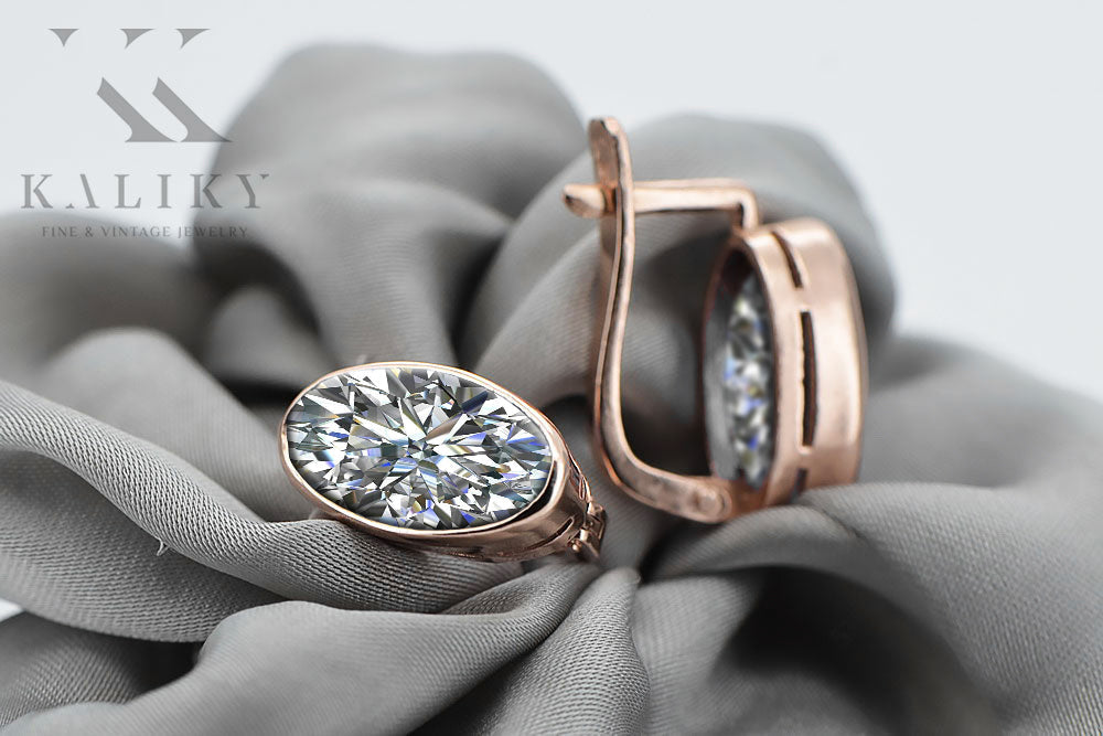 Vintage Zircon Earrings in 14K Rose Gold (vec001r-zi) — worn on the hand, showing profile