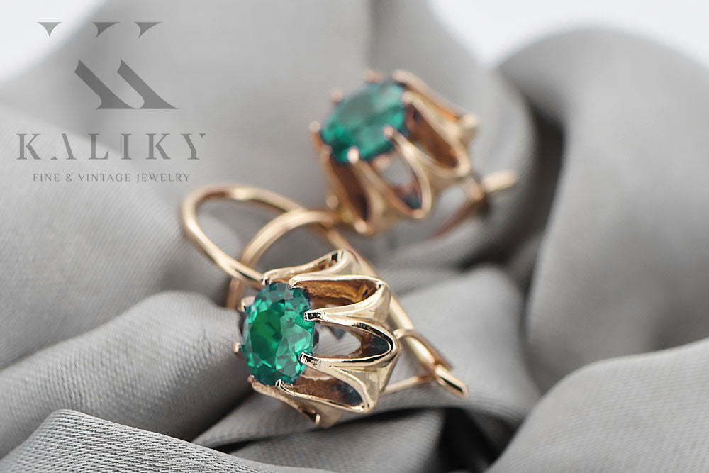 Vintage Emerald Earrings in 14K Rose Gold (vec092r-em) — worn on the hand, showing profile