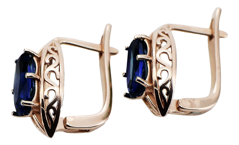 Vintage Sapphire Earrings in 14K Rose Gold (vec141r-sp) — worn on the neckline, showing the drape